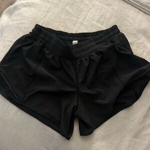 Black lululemon running shorts with zipper